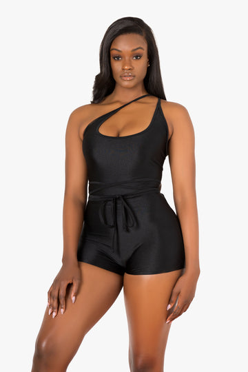 Mono negro con cordones en la espalda